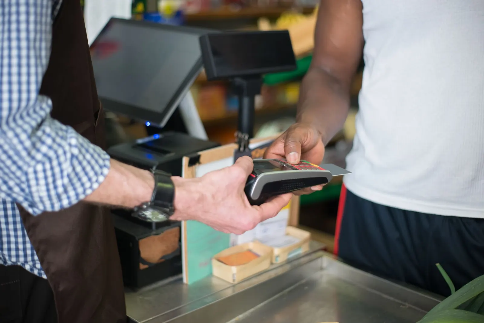 Card payment at a restaurant counter