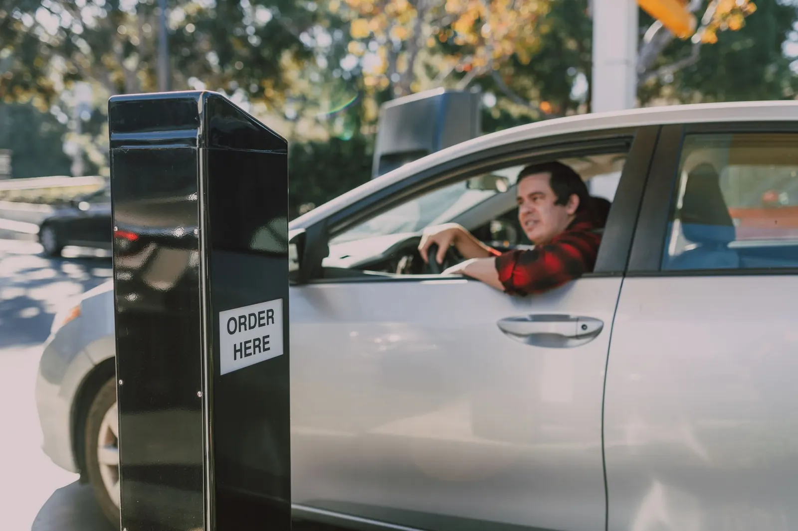 Driver ordering at a drive-thru speaker post